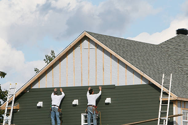 Professional Storm Damage Siding Repair technician working in Chester Gap, VA